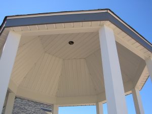 Close-up of the soffit and fascia of a gazebo from the ground